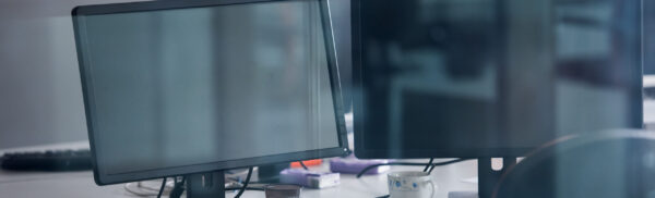 empty startup office interior with modern computers and  dual screen monitors